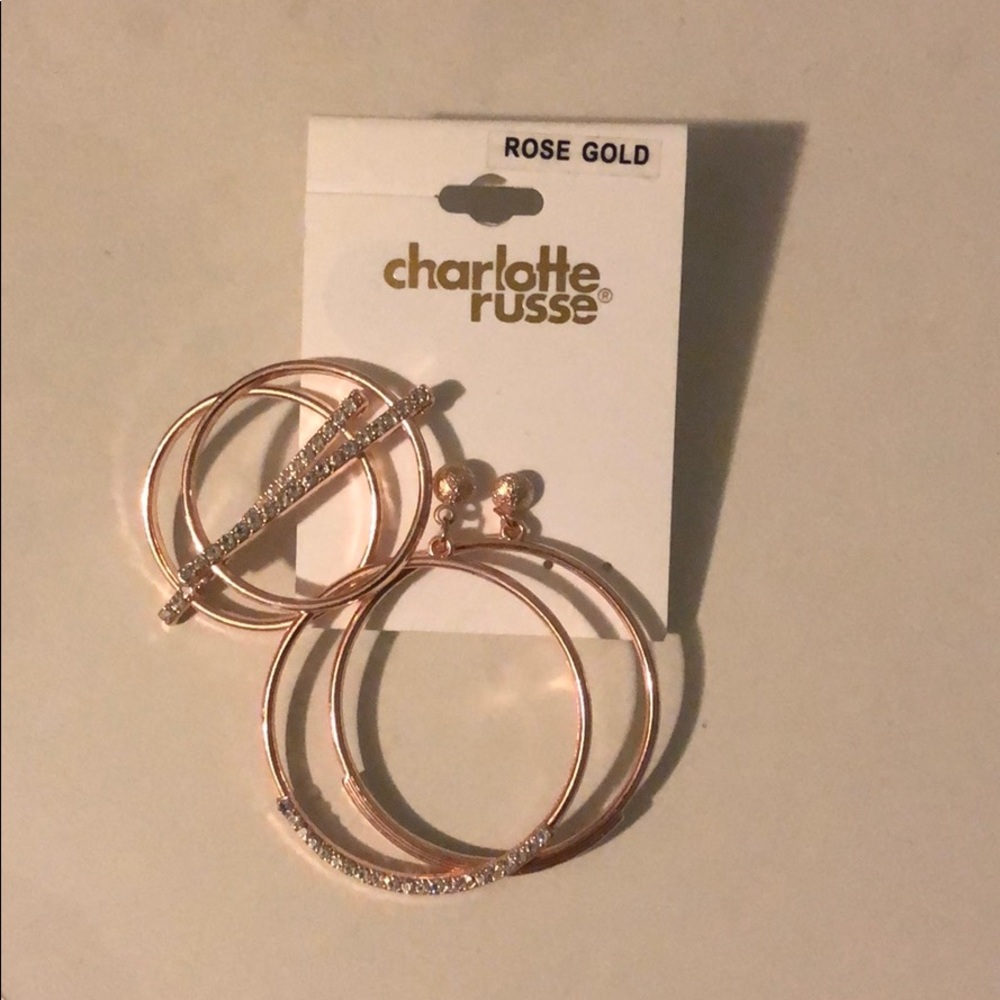 2 pairs of rose gold earrings